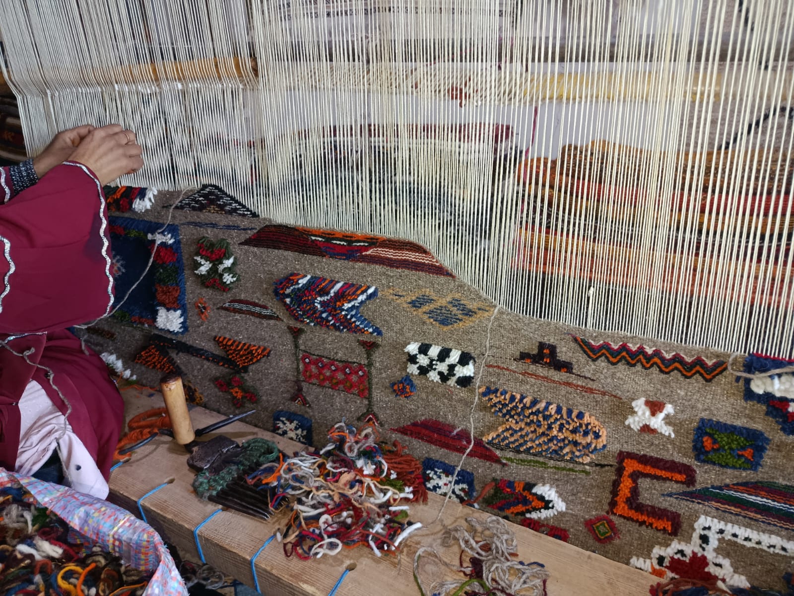 Moroccan women artisans weaving